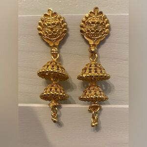 Gold tone triple dangle earrings. Indian design. Worn 1x. 1 3/4 inches long